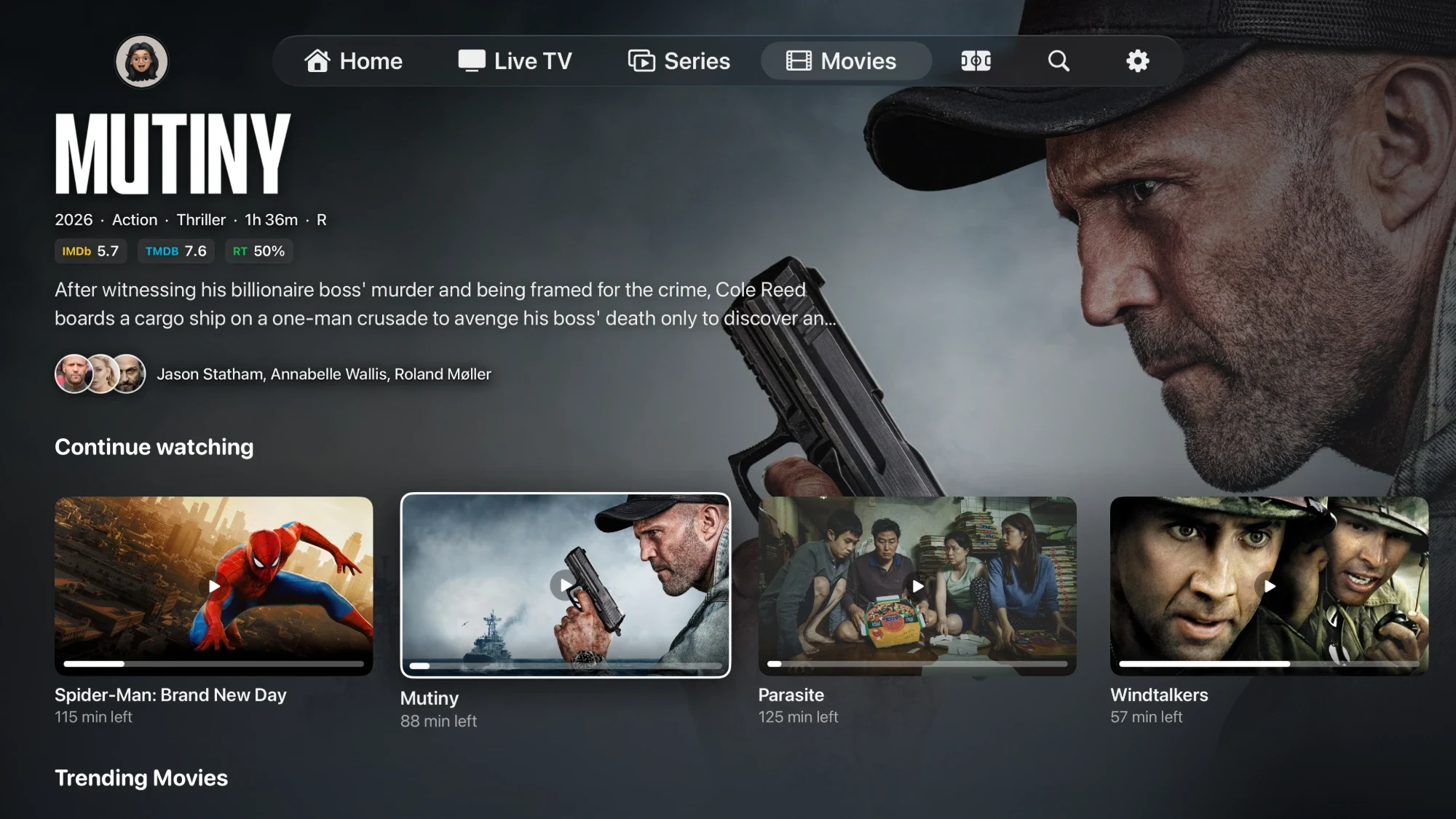 Movies in NowSeen on Apple TV: a featured title with ratings and cast above a Continue watching row.